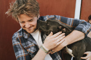 man-with-his-pit-bull-terrier-dog.jpg